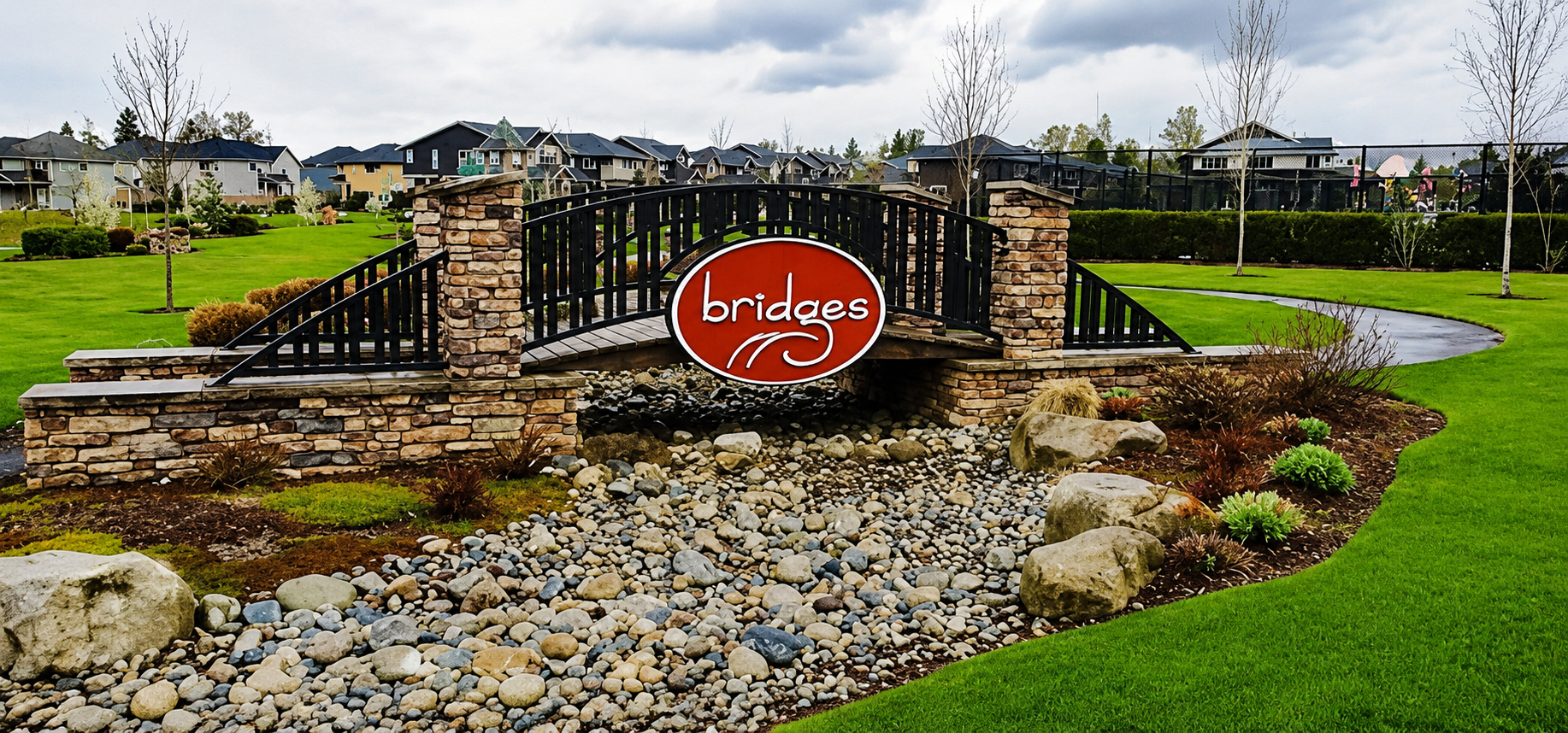 Stone bridge with "Bridges" sign over rocks.
