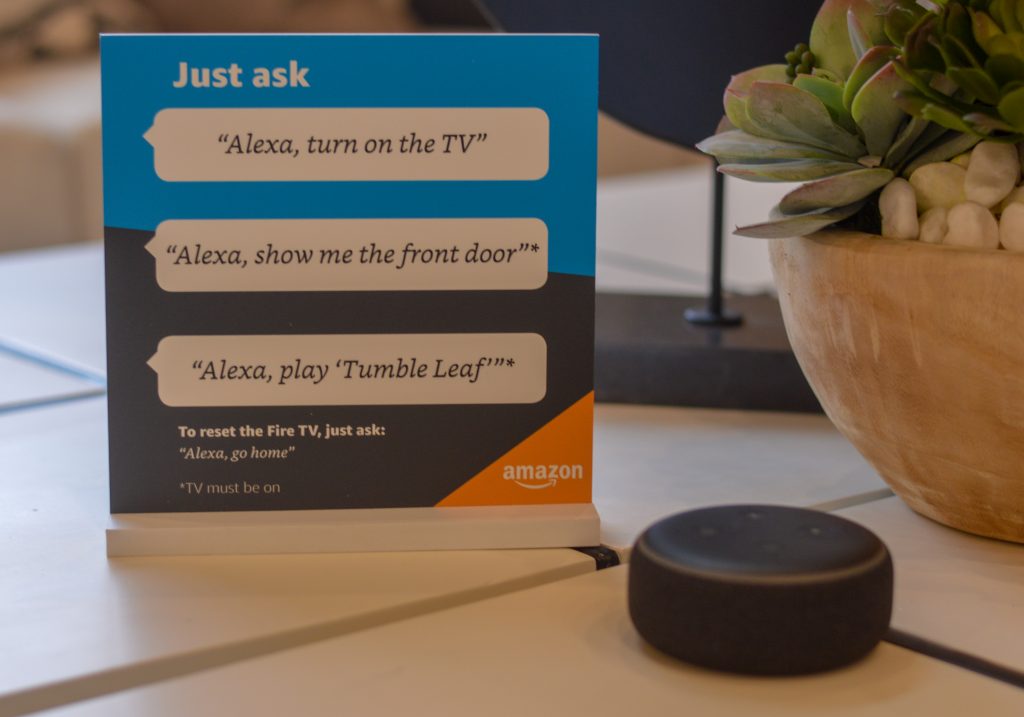 Smart speaker with Alexa instructions displayed