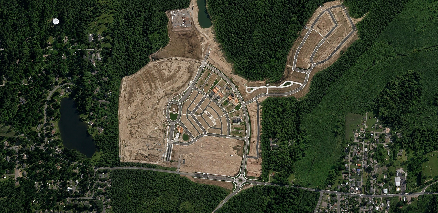 Aerial view of housing development under construction.